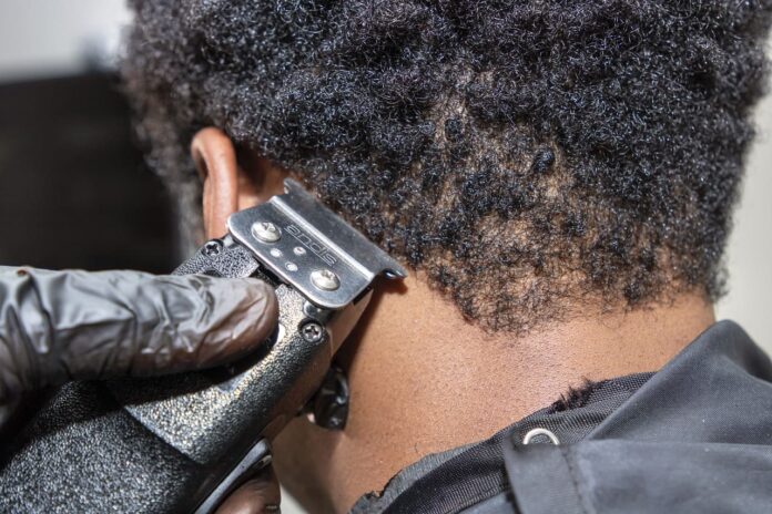 Qu'est-ce que la coupe Taper pour homme noir?